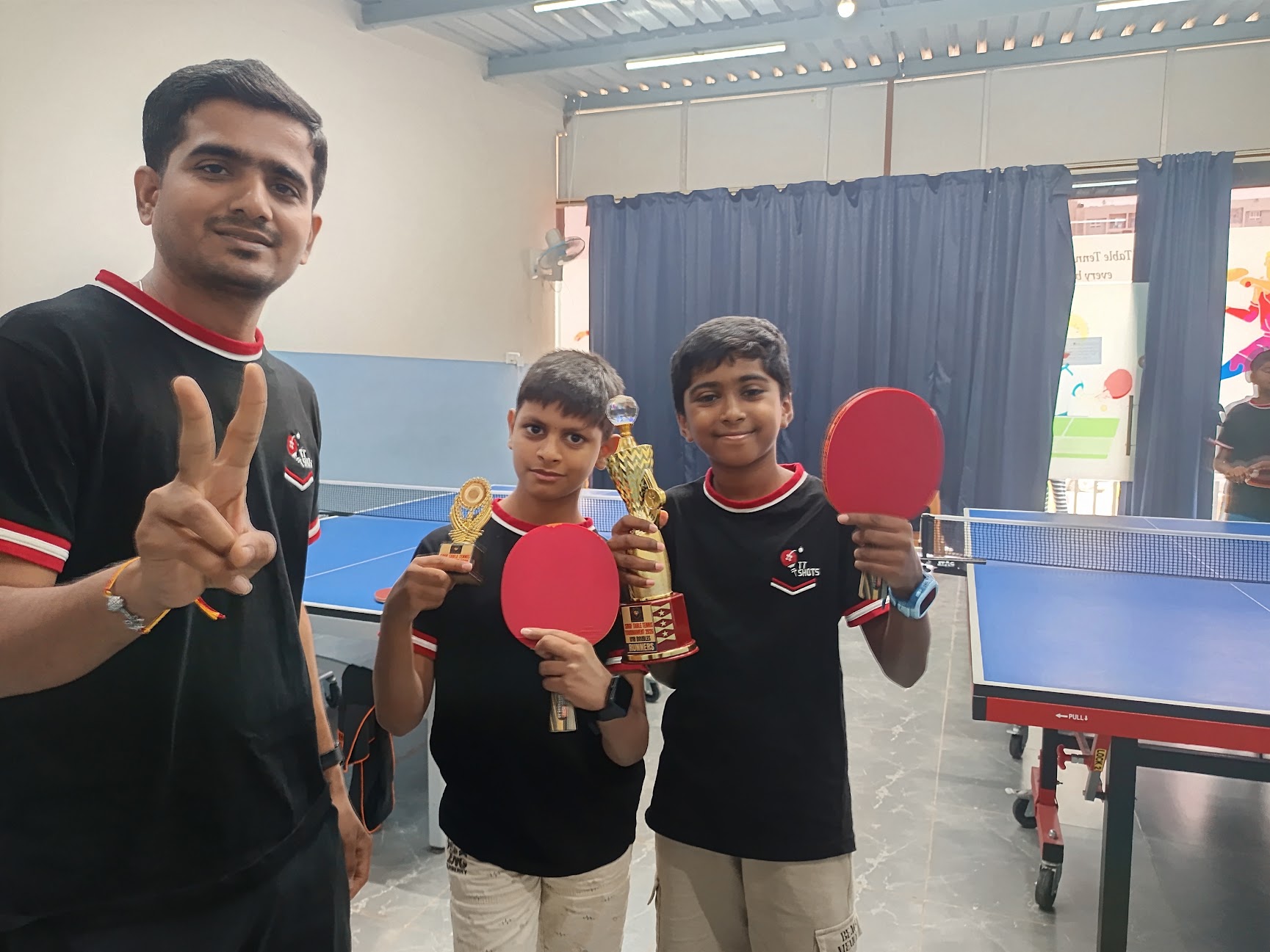 TTShots student trophy celebration with Anirudh and Vihan