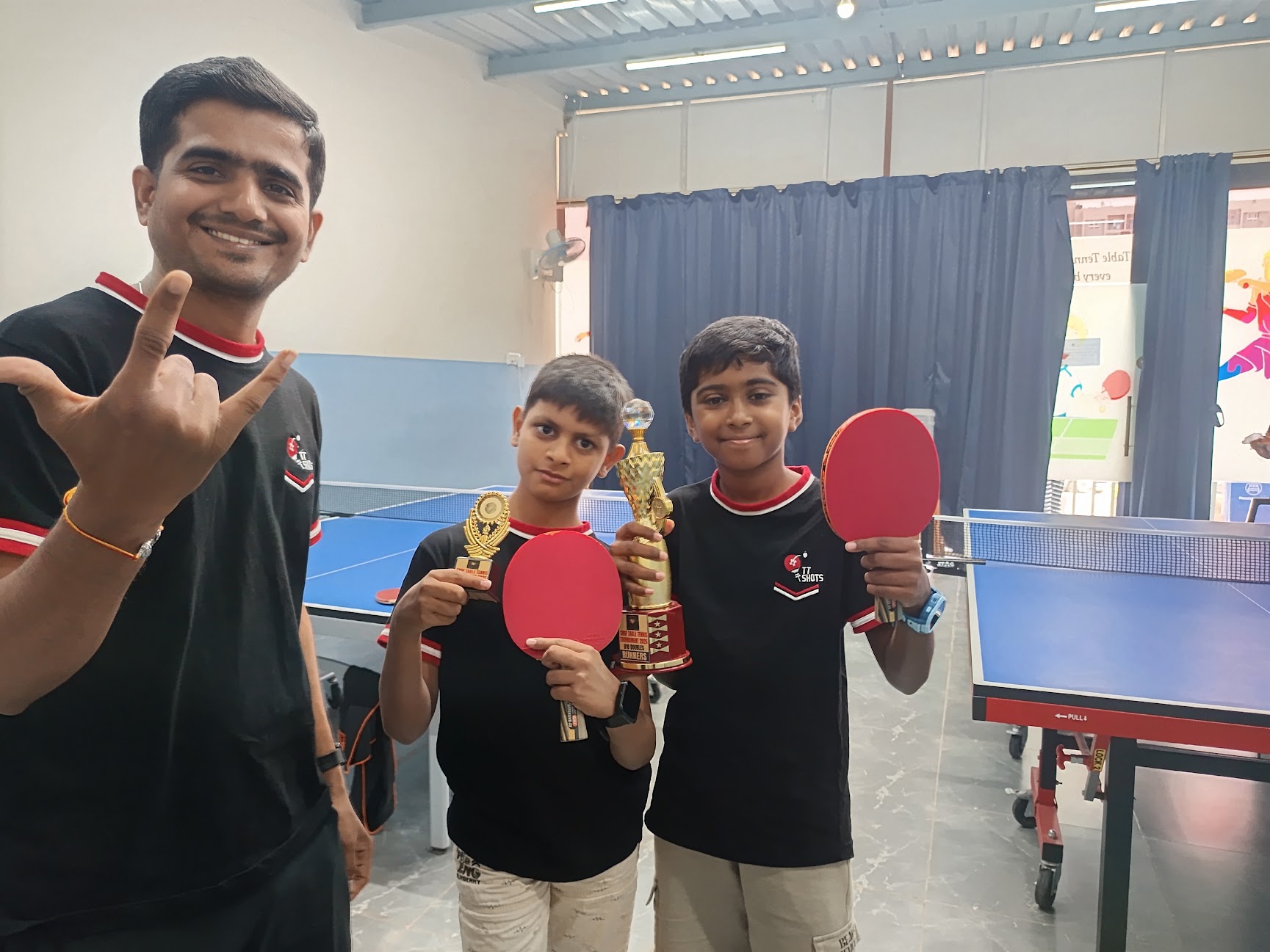 Coaching moment with students after tournament success